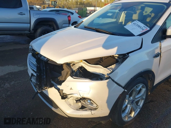 2017 Ford Escape Titanium with VIN 1FMCU0J98HUA75690, listed as a IAAI auction lot 41358534 with 90,376 mi miles. Bid and sale history available at carsss.com. Image 18.