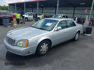 2003 Cadillac DeVille with VIN 1G6KD54Y63U115955, listed as a IAAI auction lot 41980561 with 176,624 mi miles. Bid and sale history available at carsss.com. Image 2.