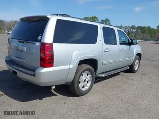 2013 Chevrolet Suburban LT with VIN 1GNSKJE71DR213143, listed as a IAAI auction lot 41585336 with 103,635 mi miles. Bid and sale history available at carsss.com. Image 4.