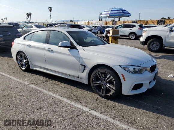2015 BMW 4 Series 428i with VIN WBA4A9C59FGL87249, listed as a Copart auction lot 52182775 with 57,797 mi miles and Salvage title. Bid and sale history available at DreamBid. Image 4.