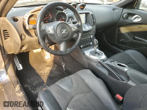 2016 Nissan 370Z Touring z VIN JN1AZ4FH5GM910098, wystawiony jako Copart lot #50812945 z przebiegiem 67 512 mil mil oraz Szkoda całkowita • Salvage title. Historia ofert i sprzedaży dostępna na DreamBid. Obrazek 8.