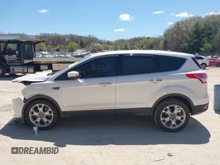 2013 Ford Escape SEL с VIN 1FMCU9H96DUD88466, выставлен на аукционе IAAI как лот 42202030 с пробегом 135 424 миль миль и . История ставок и продаж доступна на DreamBid. Изображение 14.