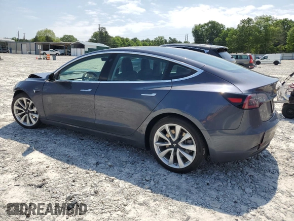 2019 Tesla Model 3 Mid Range with VIN 5YJ3E1EA9KF314367, listed as a Copart auction lot 54753605 with 97,913 mi miles and Salvage Title. Bid and sale history available at DreamBid. Image 2.