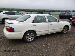 2001 Mazda 626 LX z VIN 1YVGF22C515251837, wystawiony jako Copart lot #56854605 z przebiegiem 173 148 mil mil oraz Szkody całkowita. Historia ofert i sprzedaży dostępna na DreamBid. Obrazek 3.