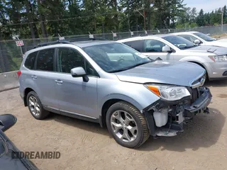 2015 Subaru Forester Touring with VIN JF2SJAWC6FH546472, listed as a IAAI auction lot 42513843 with 107,951 mi miles and . Bid and sale history available at DreamBid. Image 13.