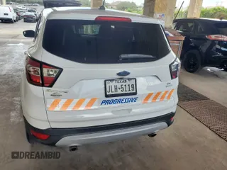 2017 Ford Escape SE z VIN 1FMCU0GD4HUC98854, wystawiony jako IAAI lot #42558269 z przebiegiem 62 975 mil mil oraz . Historia ofert i sprzedaży dostępna na DreamBid. Obrazek 13.