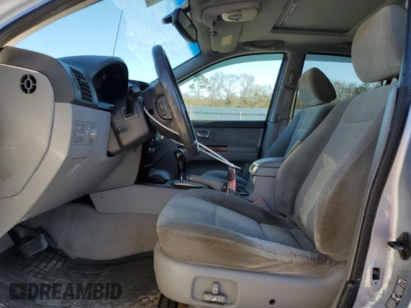 2005 Kia Sorento LX with VIN KNDJD733355371302, listed as a Copart auction lot 86979004 with 140,905 mi miles and Salvage Title. Bid and sale history available at carsss.com. Image 7.