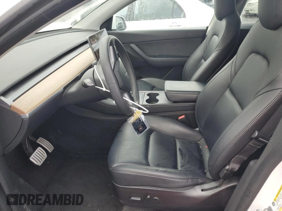 2022 Tesla Model Y Performance with VIN 7SAYGDEF3NF390848, listed as a Copart auction lot 49441025 with 42,488 mi miles and Salvage Title. Bid and sale history available at DreamBid. Image 7.