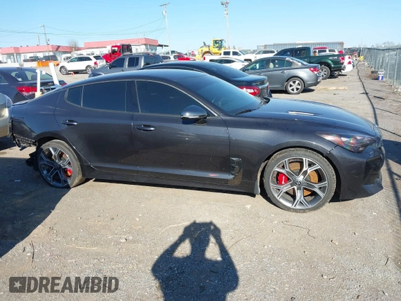 2021 Kia Stinger GT with VIN KNAE35LC4M6097199, listed as a IAAI auction lot 41884424 with 61,490 mi miles. Bid and sale history available at carsss.com. Image 12.