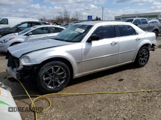 2006 Chrysler 300 C with VIN 2C3KA63H26H198177, listed as a Copart auction lot 48329365 with 197,464 mi miles and Salvage Title. Bid and sale history available at carsss.com. Image 1.