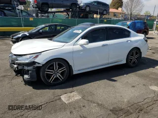 2017 Honda Accord Touring with VIN 1HGCR3F98HA021731, listed as a Copart auction lot 53645455 with 130,907 mi miles and Salvage title. Bid and sale history available at DreamBid. Image 1.