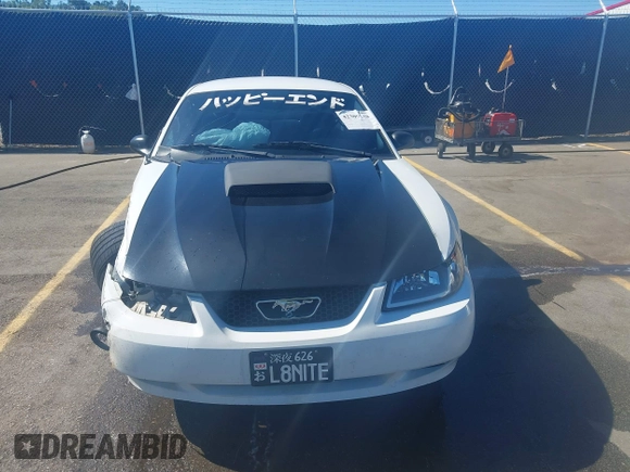 2004 Ford Mustang Standard z VIN 1FAFP40654F229283, wystawiony jako IAAI lot #42309648 z przebiegiem 164 610 mil mil oraz . Historia ofert i sprzedaży dostępna na DreamBid. Obrazek 13.