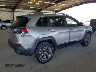 2019 Jeep Cherokee Trailhawk с VIN 1C4PJMBX0KD362032, выставлен на аукционе Copart как лот 61495195 с пробегом 49 028 миль миль и Списание • Salvage title. История ставок и продаж доступна на DreamBid. Изображение 3.