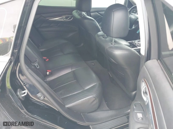 2013 Infiniti M37 with VIN JN1BY1AP0DM514046, listed as a IAAI auction lot 42031499 with 219,726 mi miles. Bid and sale history available at carsss.com. Image 8.