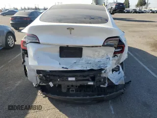 2021 Tesla Model Y Long Range with VIN 5YJYGDEE4MF204219, listed as a Copart auction lot 47429865 with 92,821 mi miles and Salvage Title. Bid and sale history available at DreamBid. Image 6.