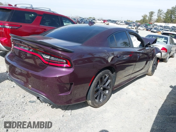 2021 Dodge Charger GT with VIN 2C3CDXHG4MH667025, listed as a IAAI auction lot 41602696 with 77,503 mi miles and . Bid and sale history available at DreamBid. Image 4.