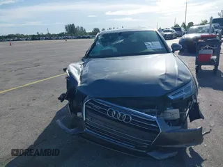 2017 Audi A4 Premium Plus with VIN WAUENAF4XHN038242, listed as a IAAI auction lot 42630736 with 128,823 mi miles and . Bid and sale history available at DreamBid. Image 12.