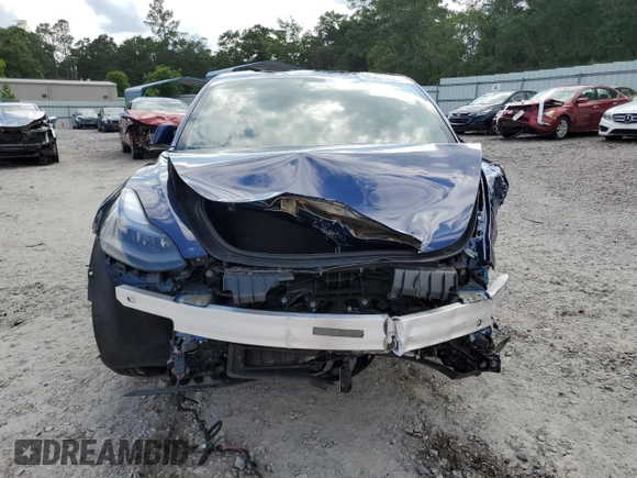 2023 Tesla Model 3 z VIN 5YJ3E1EA6PF692248, wystawiony jako Copart lot #58831805 z przebiegiem 18 607 mil mil oraz Szkoda całkowita • Salvage title. Historia ofert i sprzedaży dostępna na DreamBid. Obrazek 5.