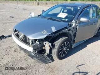 2015 Mitsubishi Lancer SE with VIN JA32V2FWXFU023626, listed as a IAAI auction lot 42012381 with 143,981 mi miles. Bid and sale history available at carsss.com. Image 6.