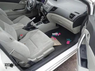 2012 Honda Civic Cpe LX with VIN 2HGFG3B54CH565952, listed as a IAAI auction lot 41550347 with 105,156 mi miles. Bid and sale history available at carsss.com. Image 5.