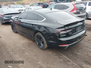 2019 Audi A5 Sportback Premium with VIN WAUANCF50KA054404, listed as a IAAI auction lot 41497979 with 90,736 mi miles. Bid and sale history available at carsss.com. Image 3.
