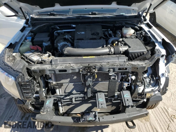 2023 Nissan Frontier S z VIN 1N6ED1CMXPN609671, wystawiony jako Copart lot #77313244 z przebiegiem 38 243 mil mil oraz Szkoda całkowita • Salvage title. Historia ofert i sprzedaży dostępna na DreamBid. Obrazek 12.