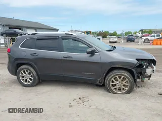 2017 Jeep Cherokee Latitude with VIN 1C4PJMCBXHW515628, listed as a IAAI auction lot 42295318 with 88,923 mi miles and . Bid and sale history available at DreamBid. Image 14.