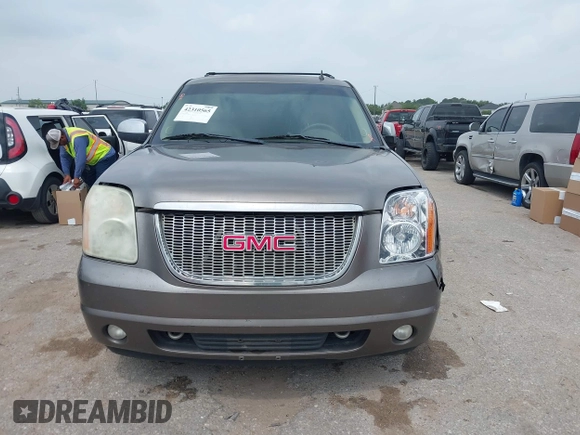 2011 GMC Yukon XL SLT z VIN 1GKS1KE07BR183572, wystawiony jako IAAI lot #42310565 z przebiegiem 341 982 mil mil oraz . Historia ofert i sprzedaży dostępna na DreamBid. Obrazek 12.