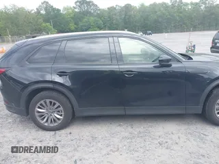 2024 Mazda CX-90 Preferred z VIN JM3KKBHD6R1118705, wystawiony jako IAAI lot #42135120 z przebiegiem 23 347 mil mil oraz . Historia ofert i sprzedaży dostępna na DreamBid. Obrazek 14.