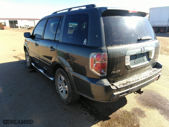 2006 Honda Pilot EX-L with VIN 2HKYF18586H514424, listed as a IAAI auction lot 41663778 with 210,020 mi miles. Bid and sale history available at carsss.com. Image 3.