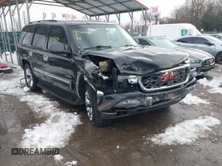 2003 GMC Yukon SLT with VIN 1GKEC13Z63R166721, listed as a IAAI auction lot 41266638 with 246,888 mi miles. Bid and sale history available at carsss.com. Image 1.