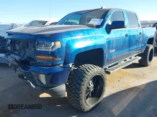 2017 Chevrolet Silverado 1500 LT with VIN 3GCUKREC8HG354004, listed as a IAAI auction lot 41429597 with 77,493 mi miles and . Bid and sale history available at DreamBid. Image 2.
