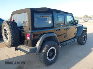 2018 Jeep Wrangler Unlimited Sport S z VIN 1C4HJXDG9JW169478, wystawiony jako IAAI lot #40387425 z przebiegiem 59 287 mil mil oraz . Historia ofert i sprzedaży dostępna na DreamBid. Obrazek 4.