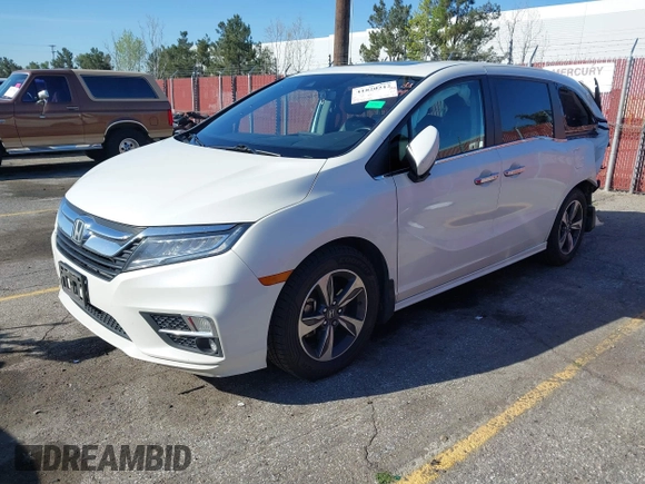 2018 Honda Odyssey Touring with VIN 5FNRL6H8XJB019122, listed as a IAAI auction lot 41820212 with 144,014 mi miles. Bid and sale history available at carsss.com. Image 23.