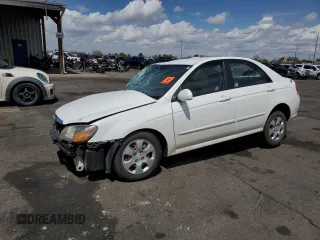 2009 Kia Spectra LX with VIN KNAFE221995630318, listed as a Copart auction lot 55817285 with Not provided miles and Non repairable. Bid and sale history available at DreamBid. Image 1.