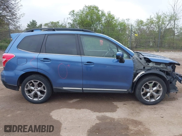 2016 Subaru Forester Touring z VIN JF2SJAVC7GH430720, wystawiony jako IAAI lot #42263999 z przebiegiem 132 853 mil mil oraz . Historia ofert i sprzedaży dostępna na DreamBid. Obrazek 13.