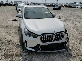 2023 BMW X1 xDrive28i with VIN WBX73EF06P5V77660, listed as a Copart auction lot 57342015 with 32,028 mi miles and Salvage title. Bid and sale history available at DreamBid. Image 14.