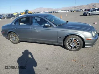 2003 Jaguar S-Type z VIN SAJEA01U03HM57757, wystawiony jako Copart lot #73440434 z przebiegiem 188 389 mil mil oraz Szkoda całkowita • Salvage title. Historia ofert i sprzedaży dostępna na DreamBid. Obrazek 4.