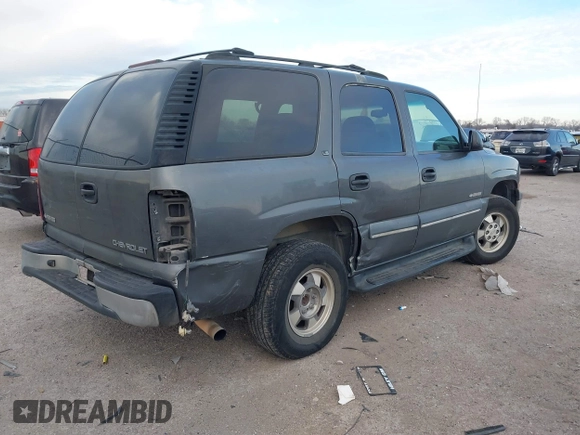 2002 Chevrolet Tahoe LS with VIN 1GNEC13V22R226380, listed as a IAAI auction lot 41261772 with 311,749 mi miles. Bid and sale history available at carsss.com. Image 4.