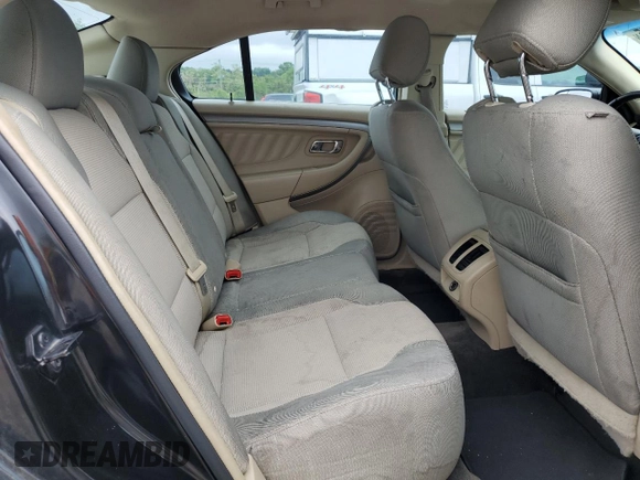 2014 Ford Taurus SEL z VIN 1FAHP2E85EG184686, wystawiony jako Copart lot #55862775 z przebiegiem 238 217 mil mil oraz Czysty tytuł • Clean title. Historia ofert i sprzedaży dostępna na DreamBid. Obrazek 10.