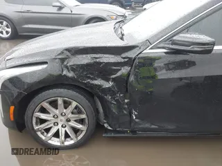 2014 Cadillac CTS Luxury AWD with VIN 1G6AX5SX3E0156938, listed as a IAAI auction lot 41574318 with 151,585 mi miles and . Bid and sale history available at DreamBid. Image 6.