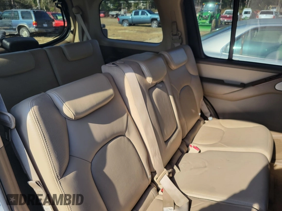 2006 Nissan Pathfinder SE z VIN 5N1AR18U46C627598, wystawiony jako IAAI lot #41527404 z przebiegiem 124 763 mil mil oraz . Historia ofert i sprzedaży dostępna na DreamBid. Obrazek 8.