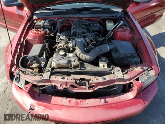 2007 Ford Mustang Deluxe z VIN 1ZVFT80N275333743, wystawiony jako Copart lot #59817145 z przebiegiem 207 762 mil mil oraz Szkoda całkowita • Salvage title. Historia ofert i sprzedaży dostępna na DreamBid. Obrazek 11.