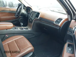 2015 Jeep Grand Cherokee Summit with VIN 1C4RJFJTXFC911170, listed as a IAAI auction lot 41523164 with 74,133 mi miles. Bid and sale history available at carsss.com. Image 5.