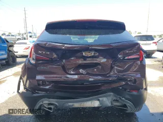 2022 Cadillac XT4 FWD Premium Luxury with VIN 1GYFZCR48NF123518, listed as a Copart auction lot 51969915 with 11,461 mi miles and Non repairable. Bid and sale history available at DreamBid. Image 6.