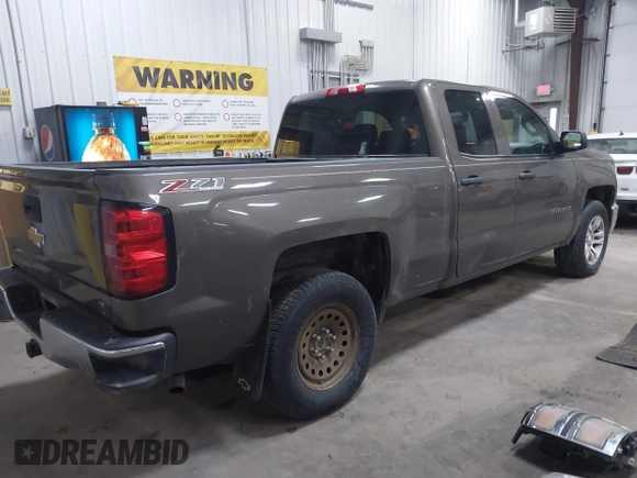 2014 Chevrolet Silverado 1500 LT with VIN 1GCVKREC9EZ240612, listed as a IAAI auction lot 41108566 with 200,625 mi miles and . Bid and sale history available at DreamBid. Image 4.
