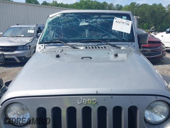 2014 Jeep Wrangler Sport with VIN 1C4AJWAG6EL192448, listed as a IAAI auction lot 42479738 with 44,848 mi miles and . Bid and sale history available at DreamBid. Image 12.