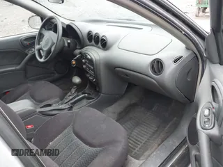 2003 Pontiac Grand Am SE with VIN 1G2NE52F03C323218, listed as a IAAI auction lot 41899309 with 90,195 mi miles. Bid and sale history available at carsss.com. Image 5.