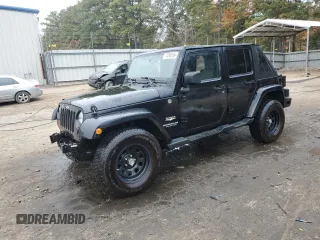 2008 Jeep Wrangler Unlimited Sahara with VIN 1J4GA59148L574934, listed as a Copart auction lot 74590164 with 134,674 mi miles and Salvage title. Bid and sale history available at DreamBid. Image 1.