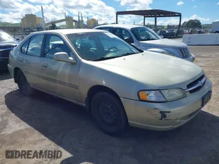 1999 Nissan Altima XE with VIN 1N4DL01D6XC179556, listed as a IAAI auction lot 41783234 with 129,064 mi miles. Bid and sale history available at carsss.com. Image 1.